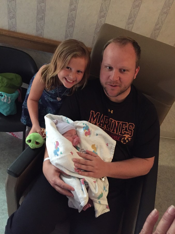 A New Addition! From L-R Big Sis Emery, New Baby Rowan, and the Big Dude...He's Lucas